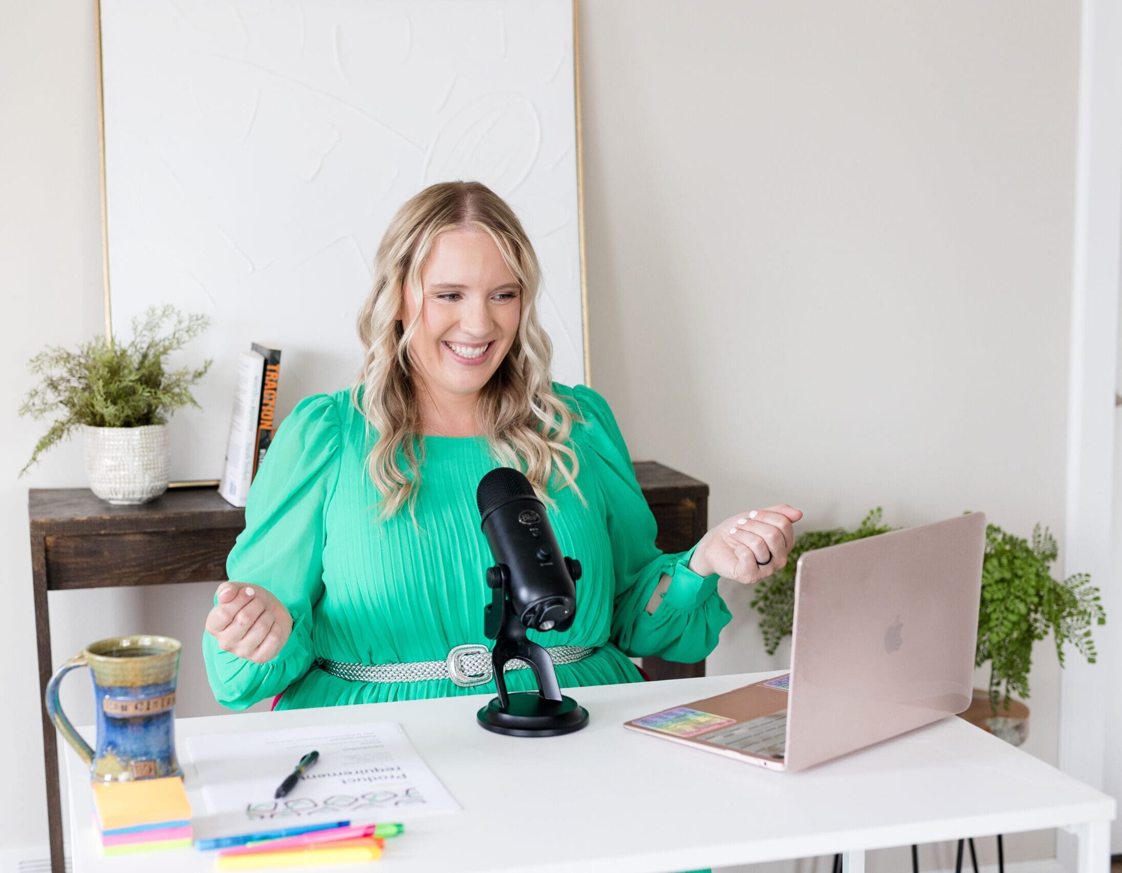 Becca at desk on video call